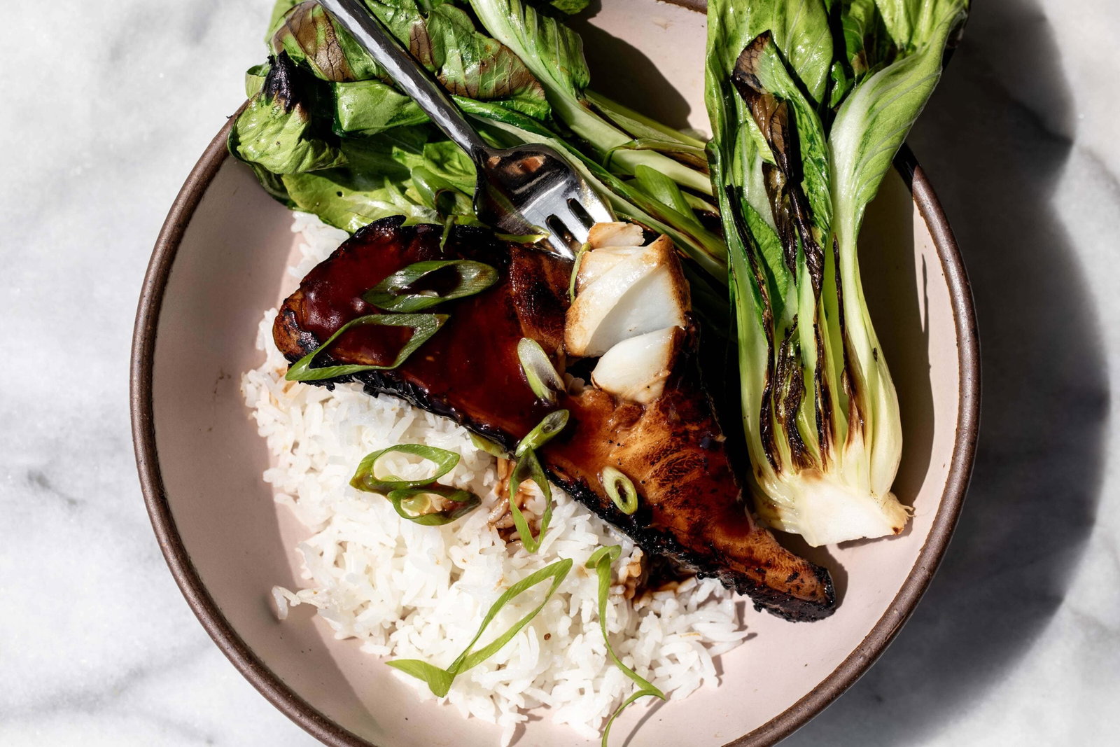 Cooked seabass on rice