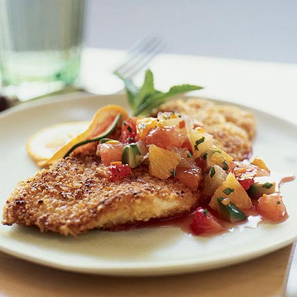 Nut crusted sole with salsa on top on plate