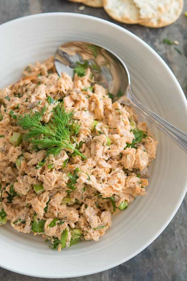 Salmon Salad - In a Bowl with Fresh Dill and Serving Spoon