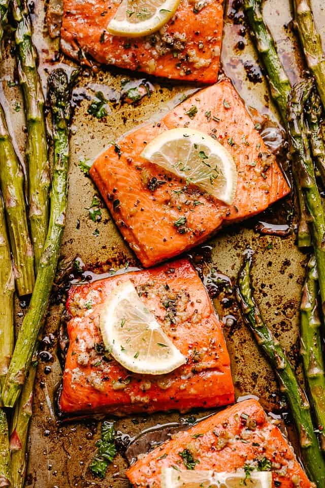 This Lemon Garlic Roasted Sockeye Salmon with Asparagus is the one pan meal you need this summer! The garlic lemon flavor is perfect with the flaky, juicy, and rich sockeye salmon. A whole fresh, healthy meal done in under 20 minutes!