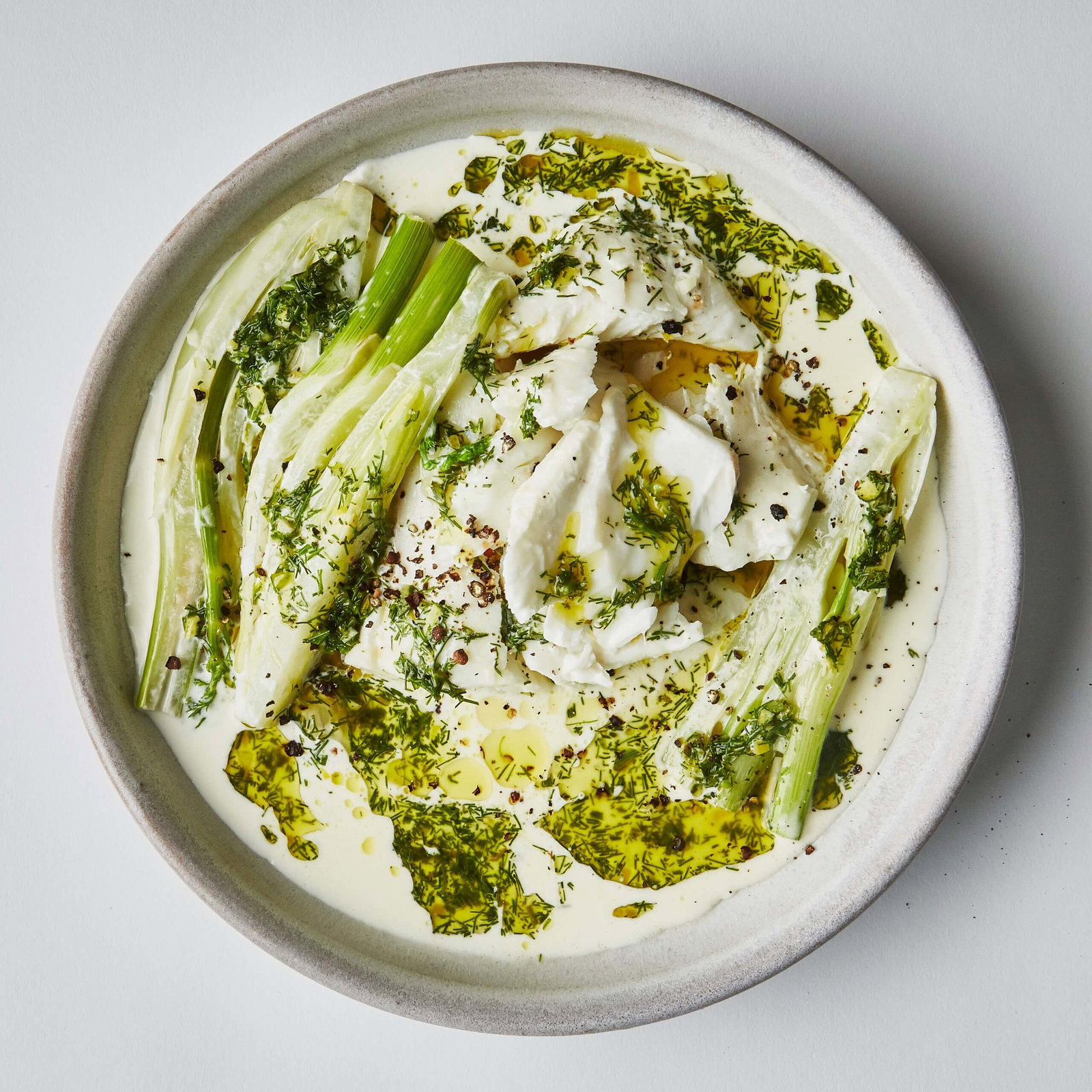 Plated Slow-Cooked Halibut with Garlic Cream and Fennel