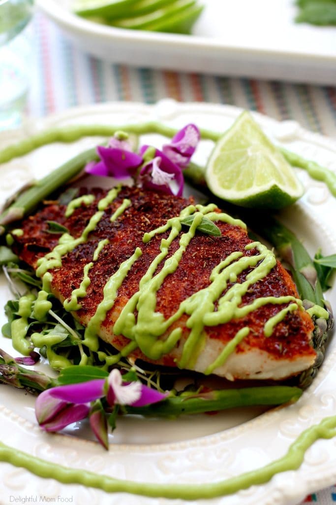 baked rockfish recipe with blackened seasoning and avocado fish taco sauce on top