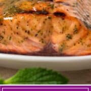 grilled wild sockeye salmon with mustard sauce on white plate