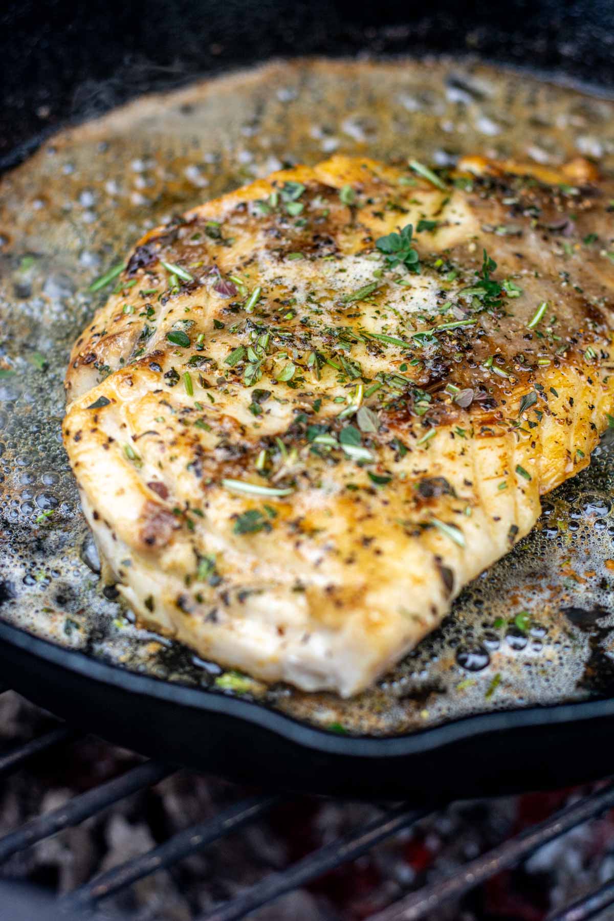 fillet of pacific rockfish topped with fresh herbs and brown butter.