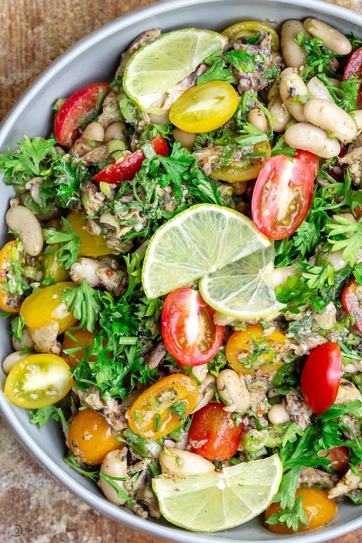 Made with simple, whole ingredients and topped with a homemade Dijon mustard and aleppo pepper dressing, this Mediterranean White Bean and Sardine Salad is a quick and easy lunch. Serve with crusty bread for a satisfying meal any day.