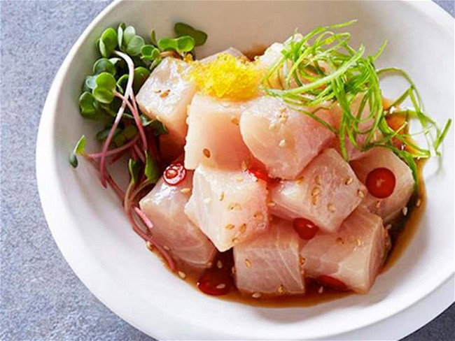 Kanpachi Poke in white bowl